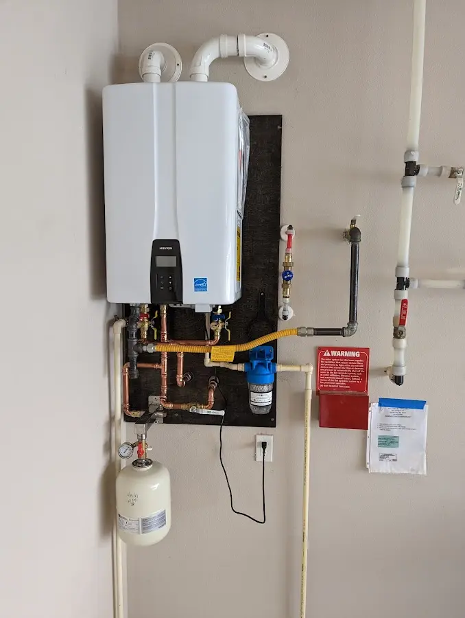 Professional plumber installing copper piping in a Gatesville home